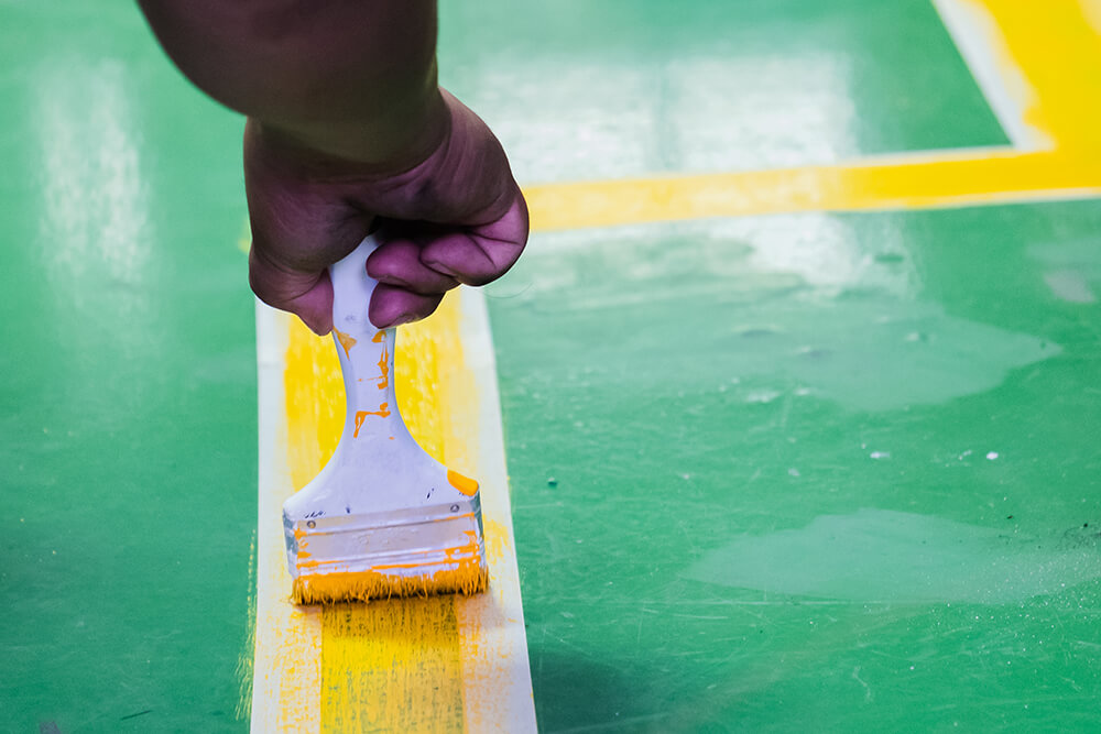 the disadvantages of line marking paint|disadvantages-of-floor-marking-paint|floor-marking-paint|scraping-up-floor-marking-paint|permastripe-floor-marking-tape-being-applied
